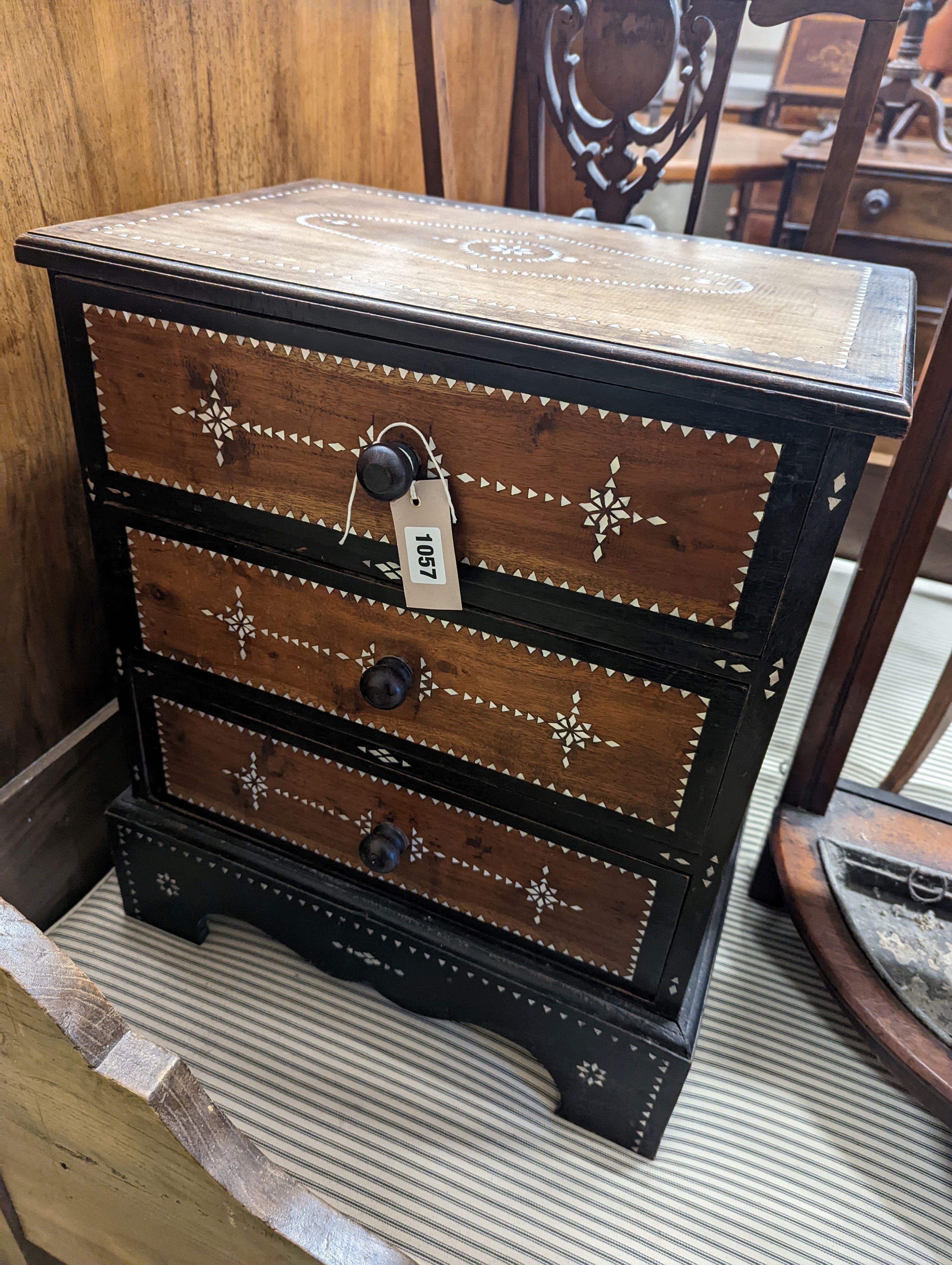 A near pair of South Asian mother of pearl inlaid three drawer small chests, larger 46cm, depth 31cm, height 54cm